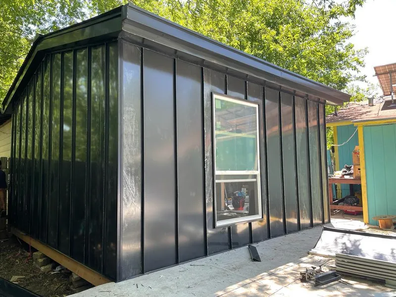 Black standing seam metal wall panels for Roof Inspection in Glenmont