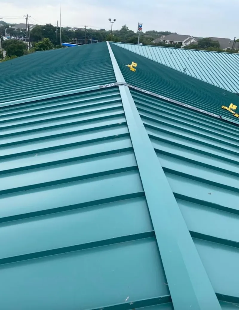 Green commercial metal roof ridge and valley for Metal Roof Repair in Glenmont