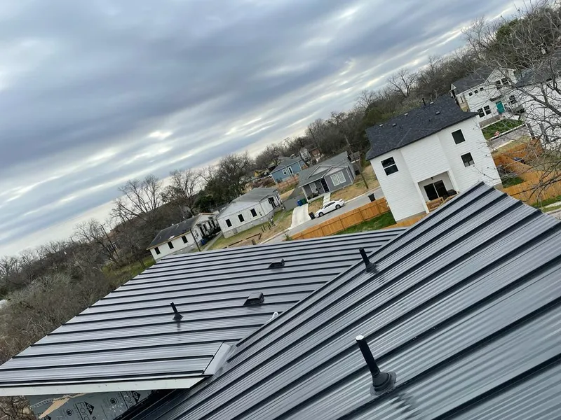 Standing seam metal roof panels with vents for Skylight Repair in Glenmont